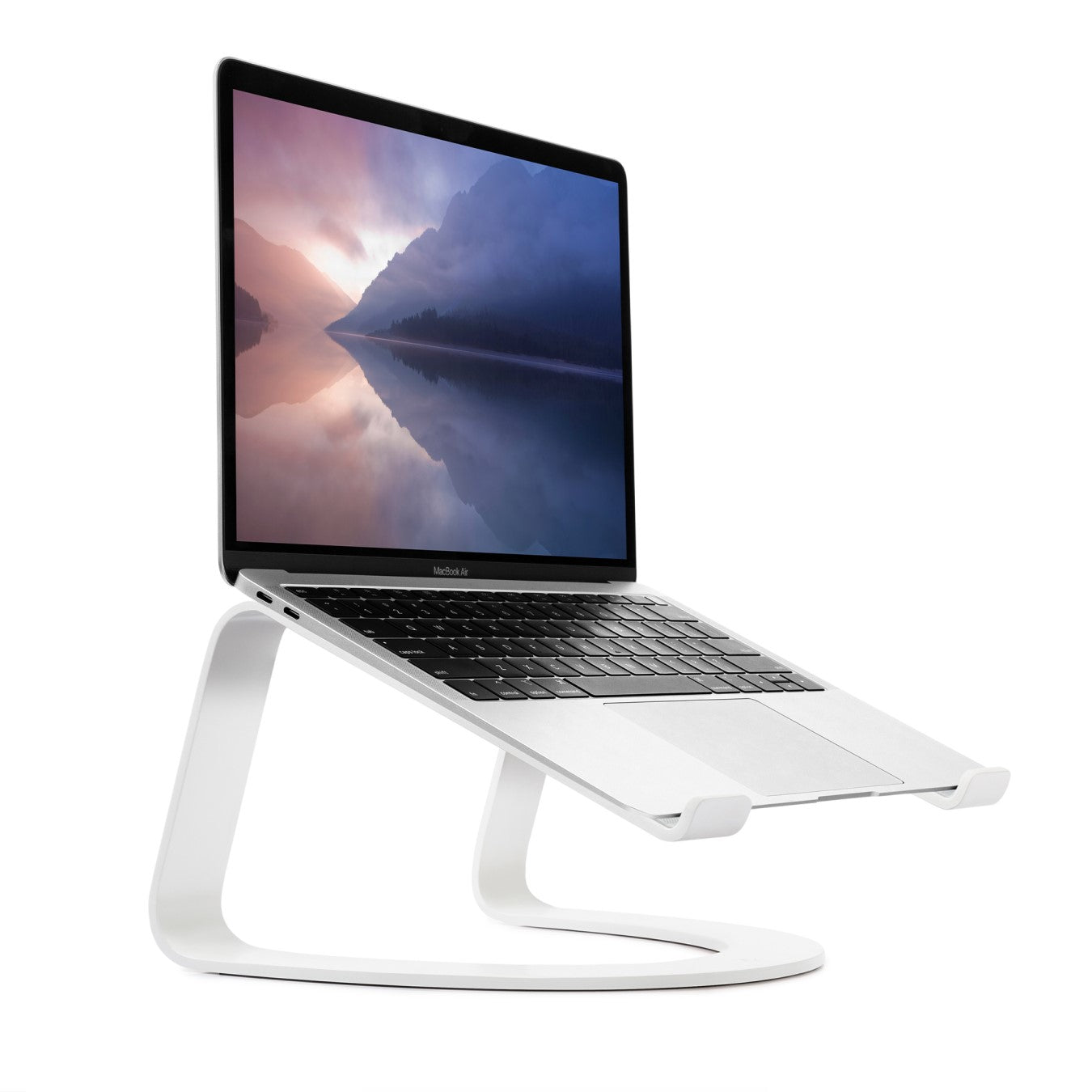 The Twelve South Curve Stand for MacBook in white holding a MacBook Pro with the screen on
